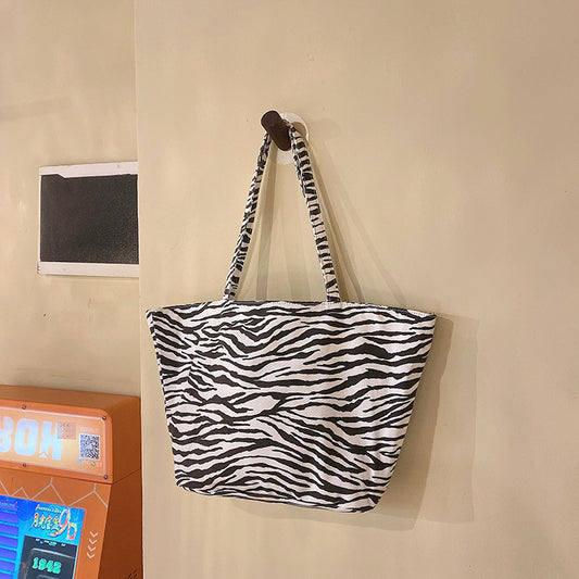 Design zebra-striped tote bags